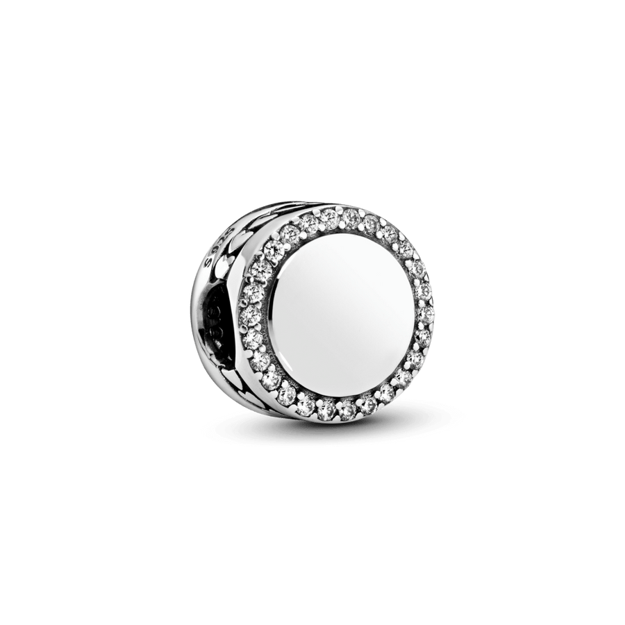 Graveeritav sädelev nööbikujuline amulett