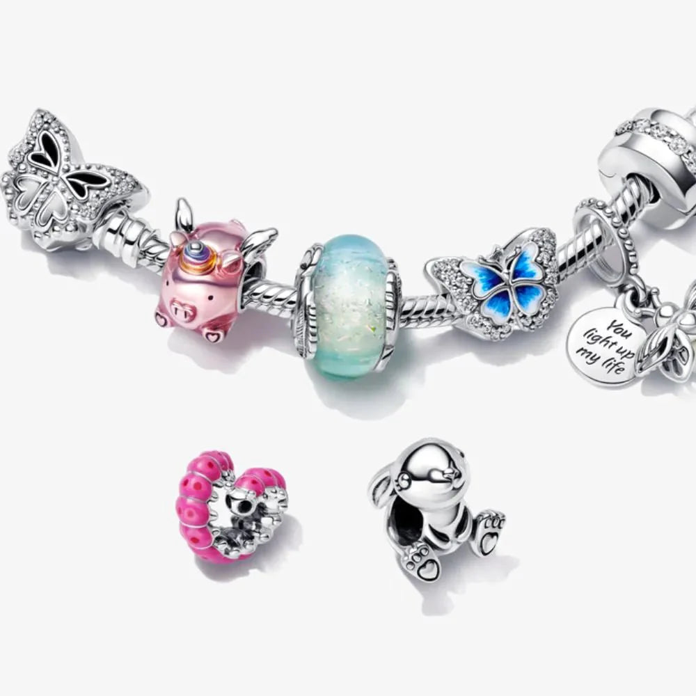 Nini triušio karoliukas - Pandora Lietuva