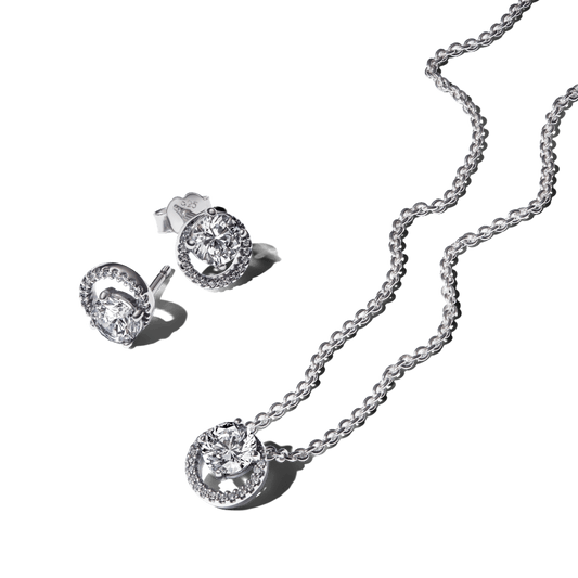 Dovanų rinkinys: Kaklo koljė su pakabuku, papuoštu žėrinčių akmenėlių aureole & Auskarai smeigės su žėrinčių akmenėlių aureole - Pandora Lietuva