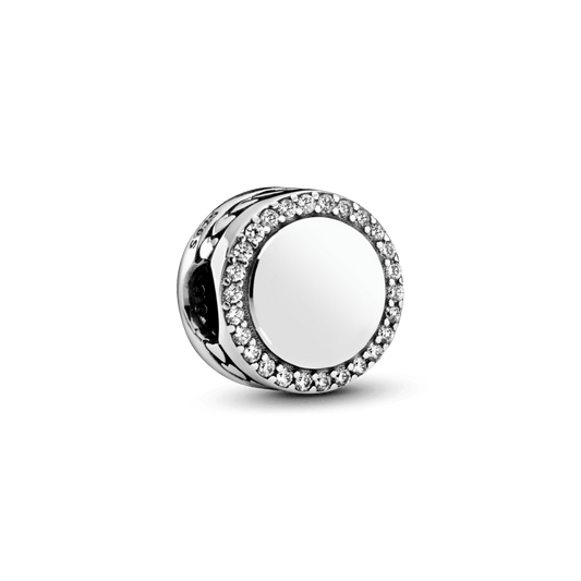 Graveeritav sädelev nööbikujuline amulett