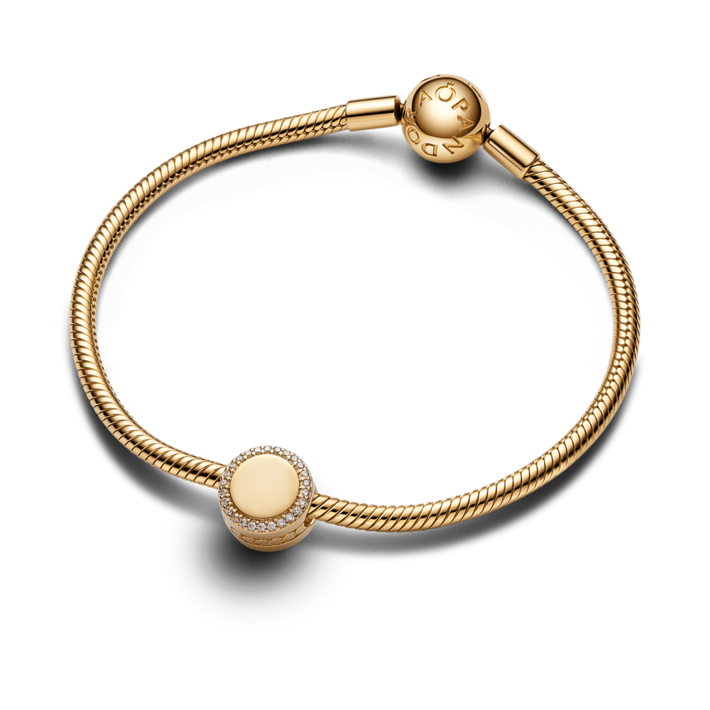 Graveeritav sädelev nööbikujuline amulett