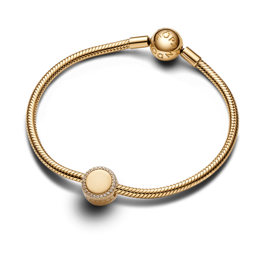 Graveeritav sädelev nööbikujuline amulett